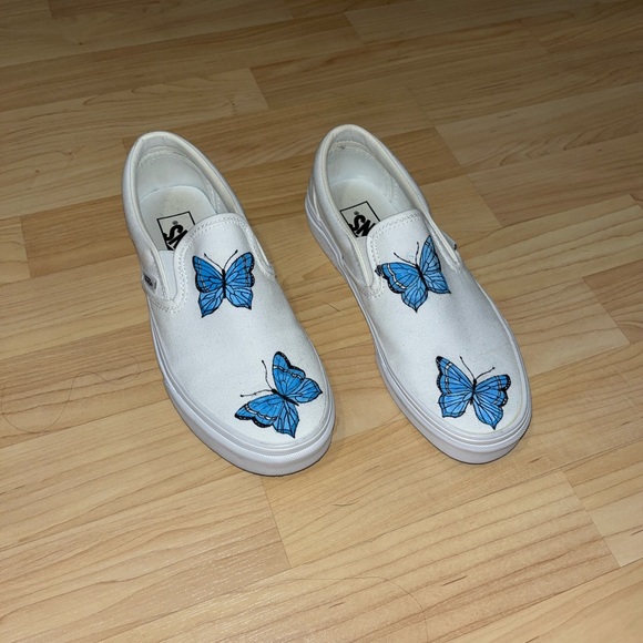 White slip on vans with painted on blue butterflies - Picture 2 of 4
